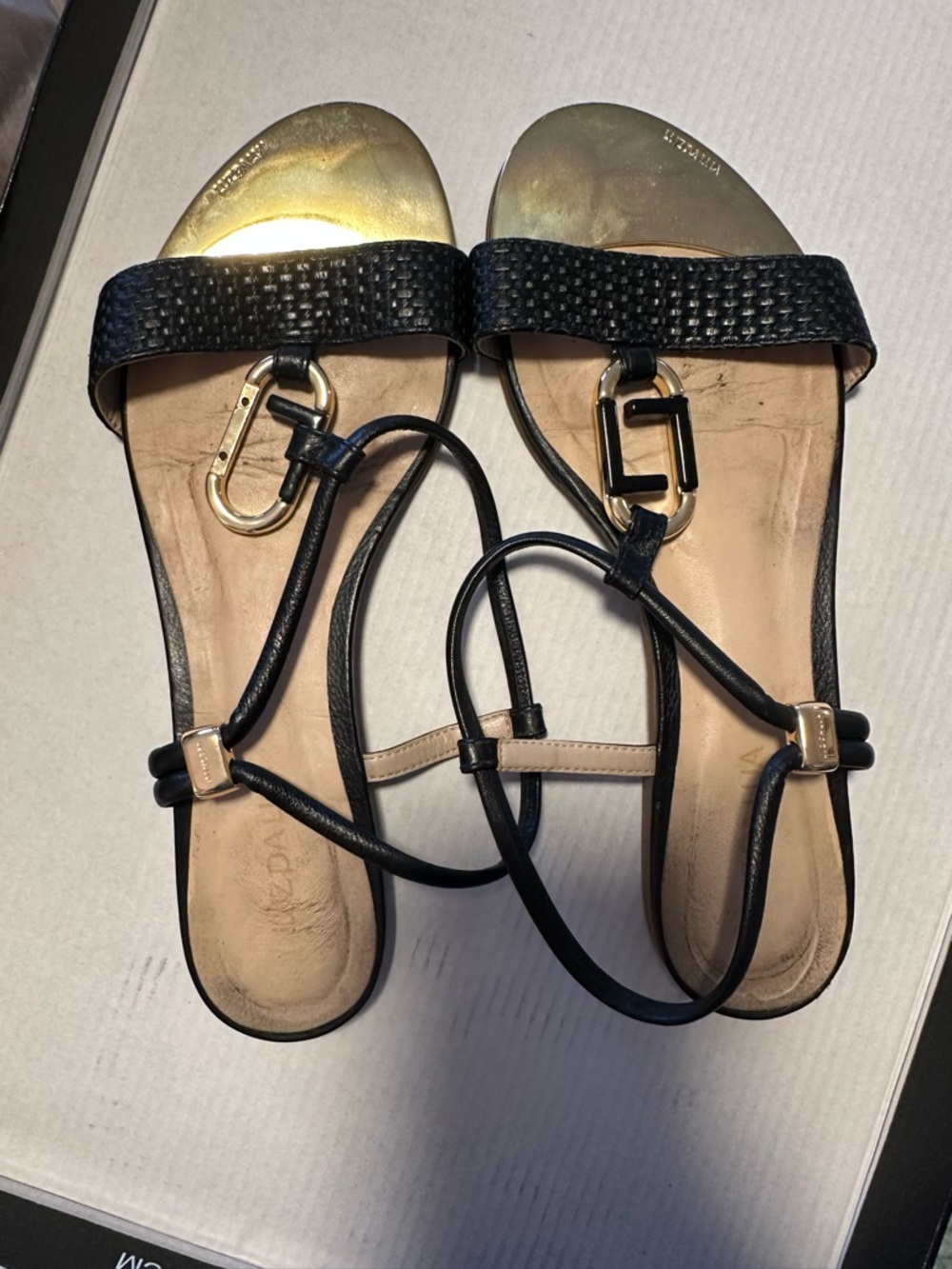 Black Leather Strappy Sandals with Gold Accent Hardware